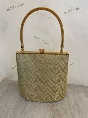 Elegant Gold Woven Handle Handbag by